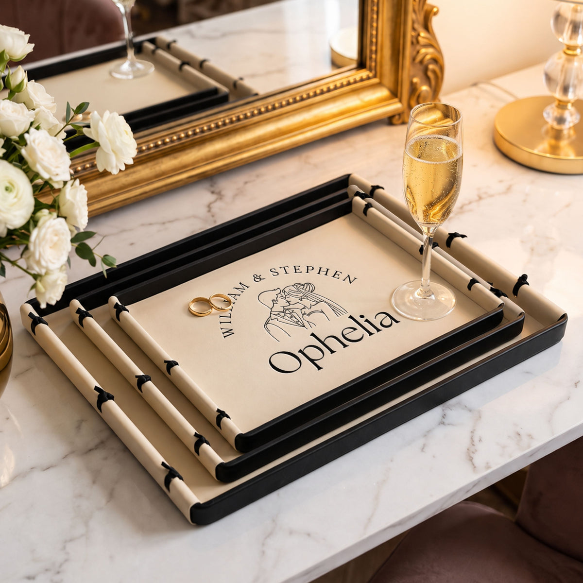 Set of three beige leatherette trays in three sizes, personalised for a wedding