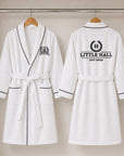 Custom embroidered waffle cotton kids bathrobe hanging in white