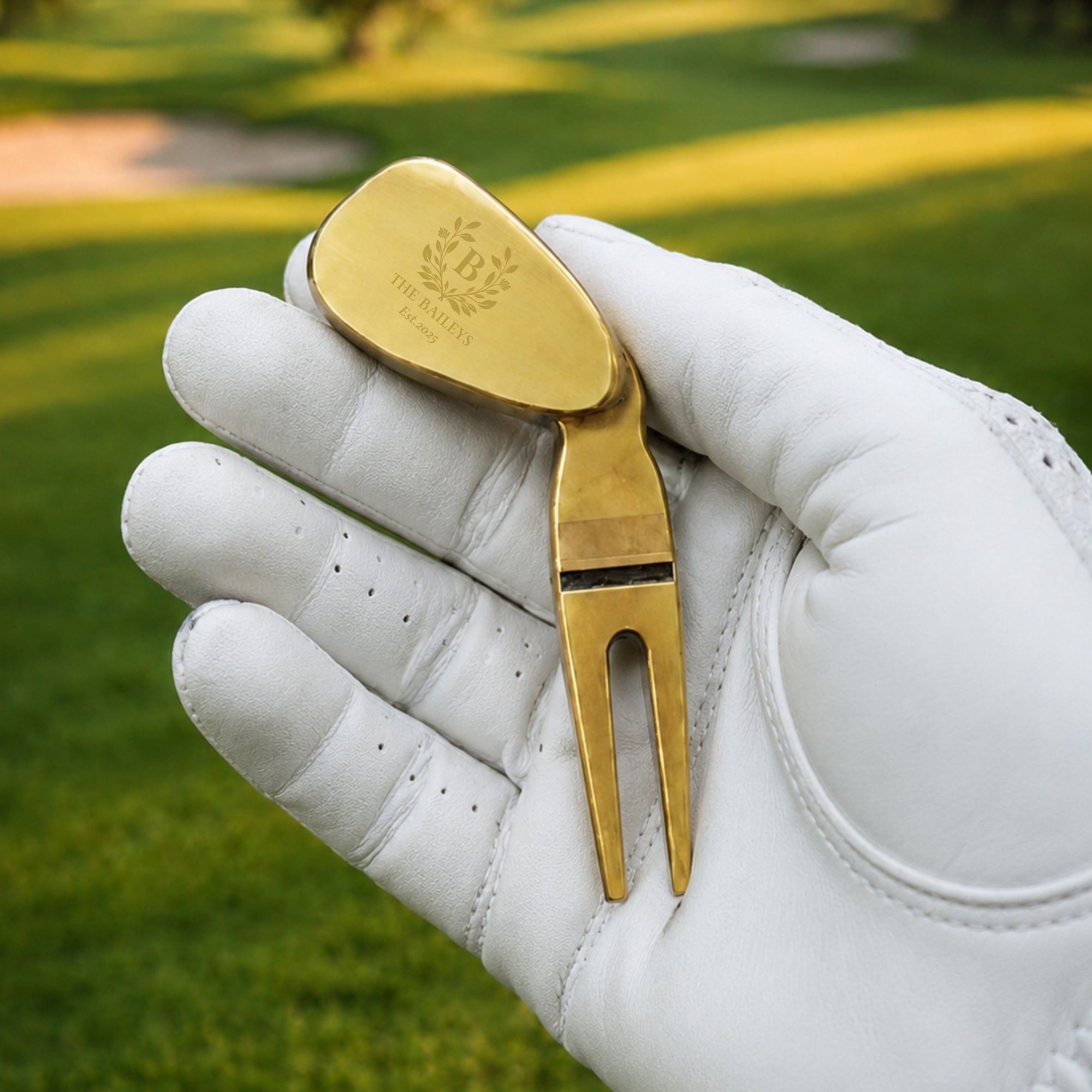 Custom engraved golf wedge divot repair tool in black silver gold and copper
