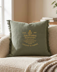 Close-up of embroidered name on personalised cotton muslin cushion cover
