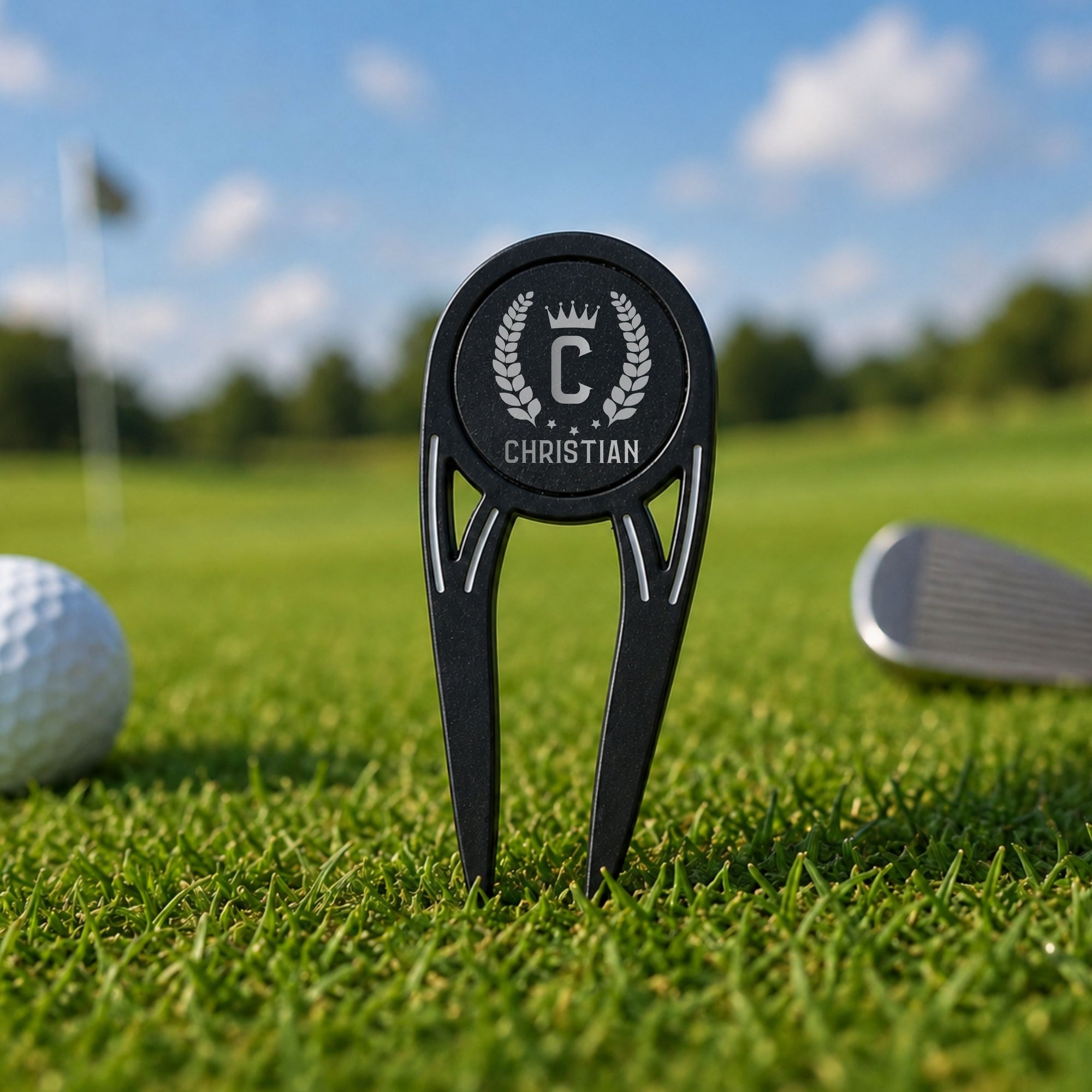 Close-up of engraved 3-in-1 golf divot tool with bottle opener