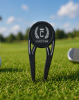 Close-up of engraved 3-in-1 golf divot tool with bottle opener