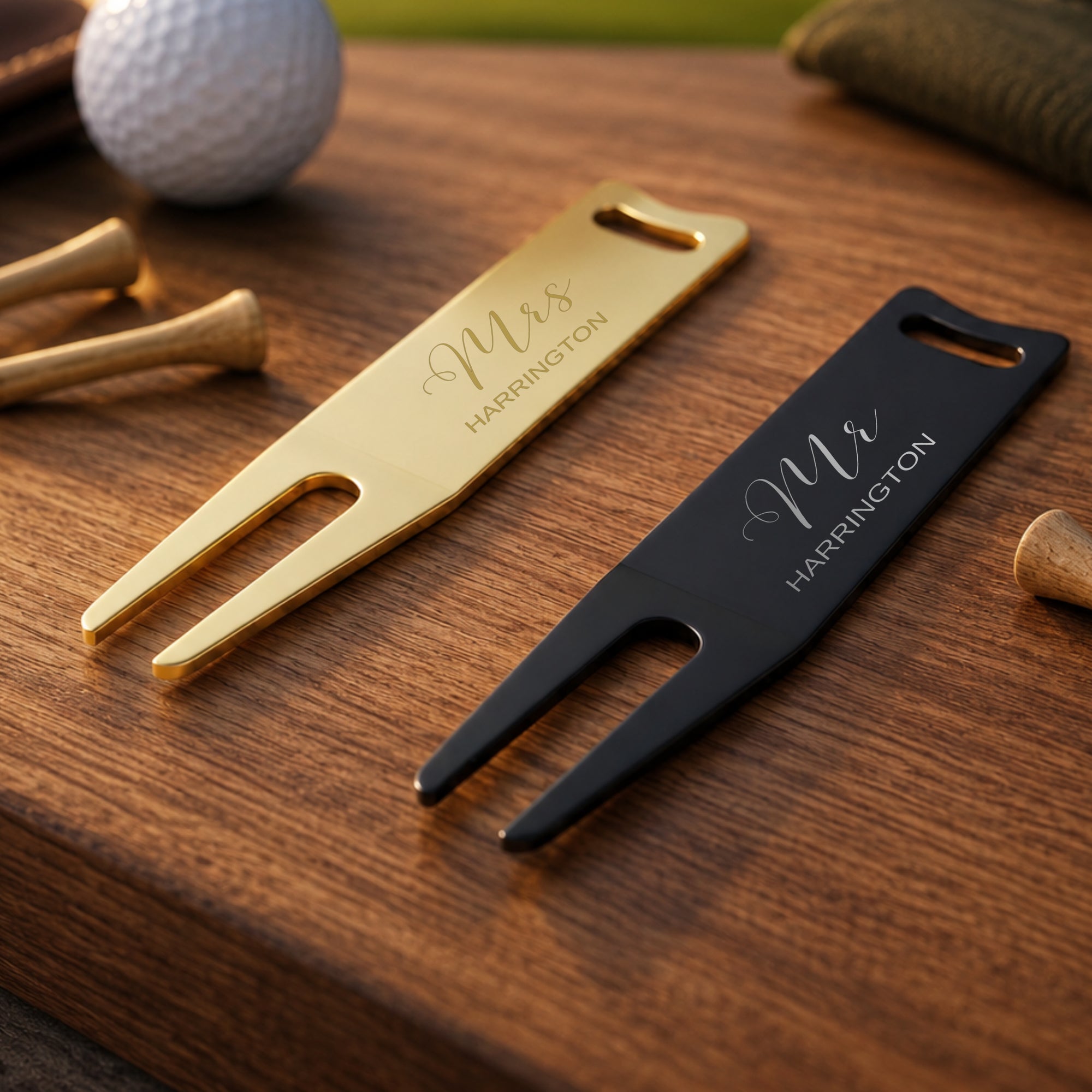 Close-up of engraved name and date on personalised golf divot repair tool