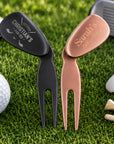 Close-up of engraved name on personalised golf wedge divot repair tool