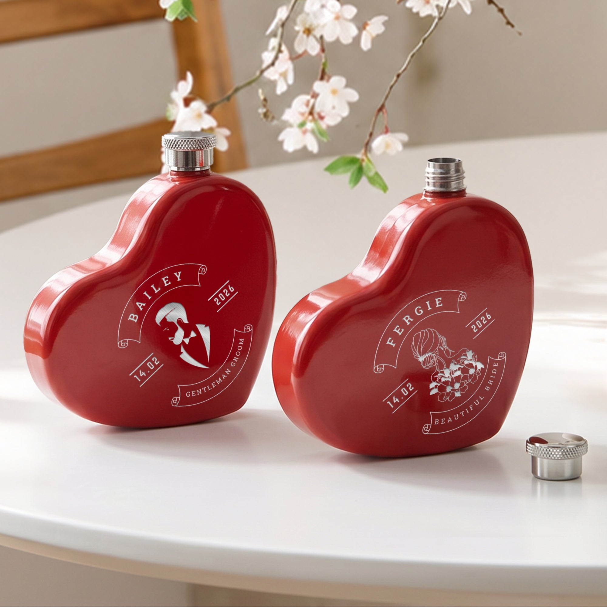 Close-up of engraved name on personalised heart hip flask