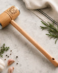 Close-up of engraved name on personalised wooden meat tenderiser hammer