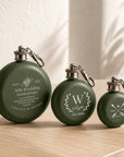 Close-up of laser engraved name on personalised round hip flask keyring