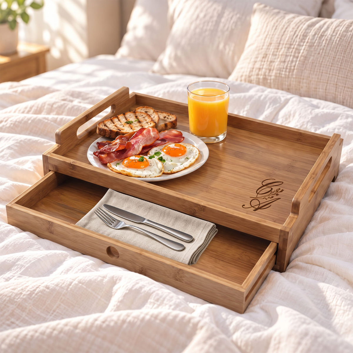 Personalised bamboo breakfast tray with pull-out drawer holding cutlery, breakfast in bed