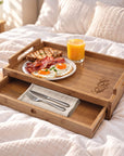 Personalised bamboo breakfast tray with pull-out drawer holding cutlery, breakfast in bed