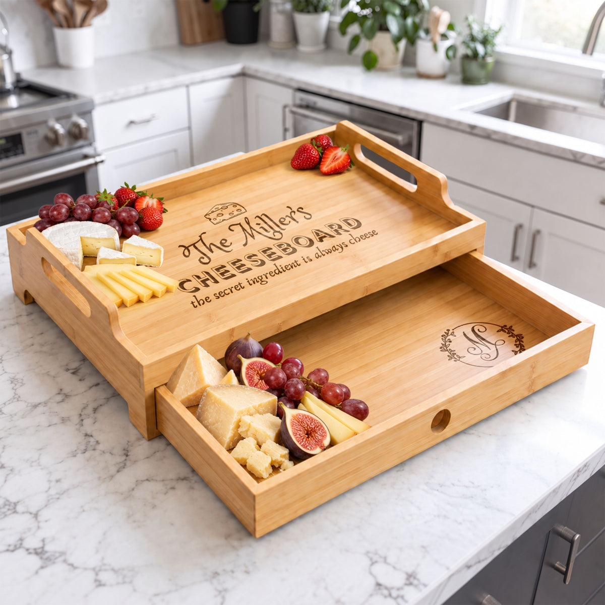 Personalised engraved bamboo serving tray with pull-out drawer, used as a charcuterie cheeseboard