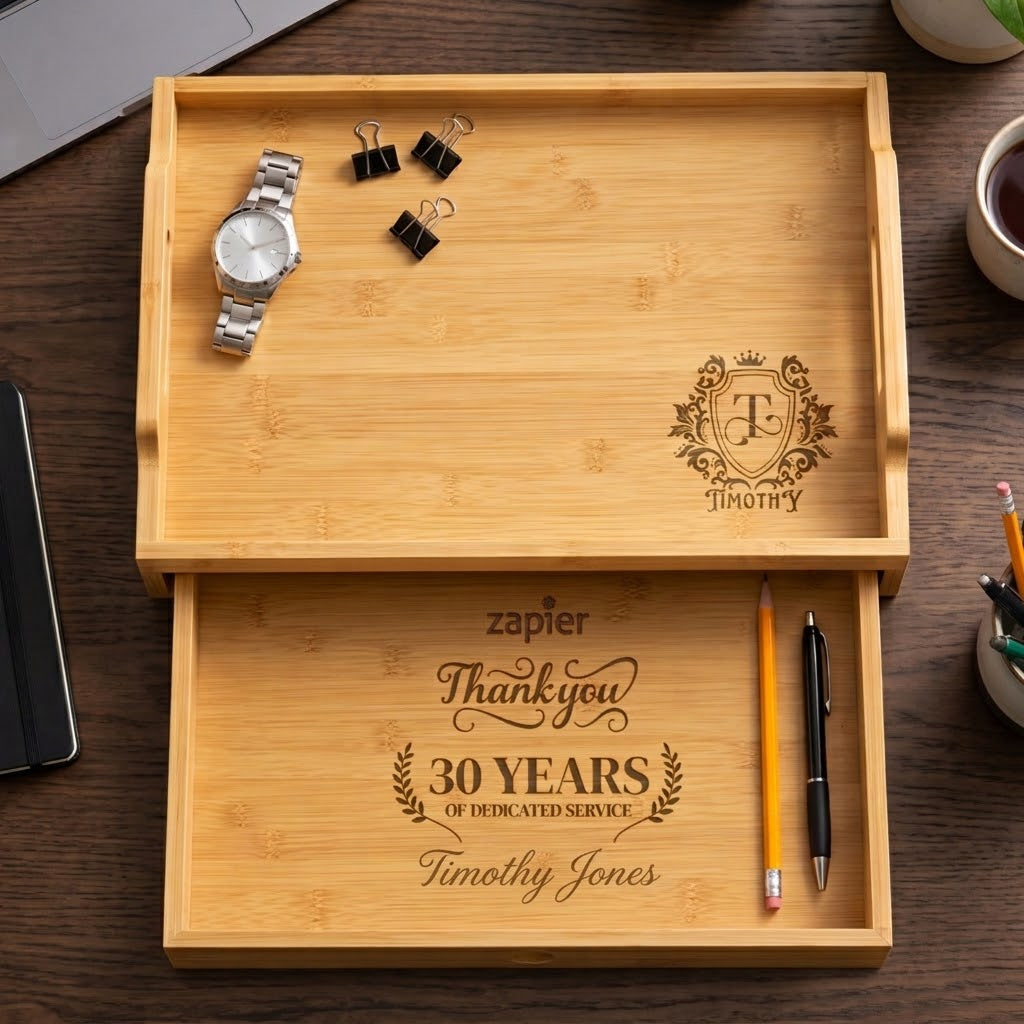 Personalised bamboo valet tray with pull-out drawer on a desk holding a watch and stationery