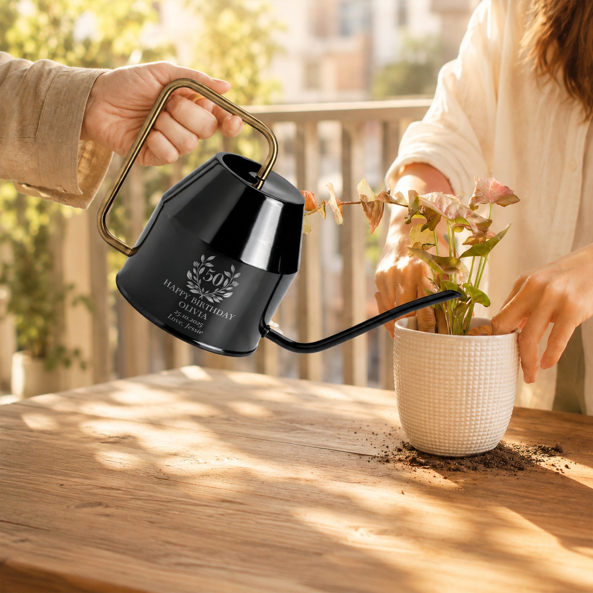 Personalised black 2L watering can with long narrow spout for precise watering
