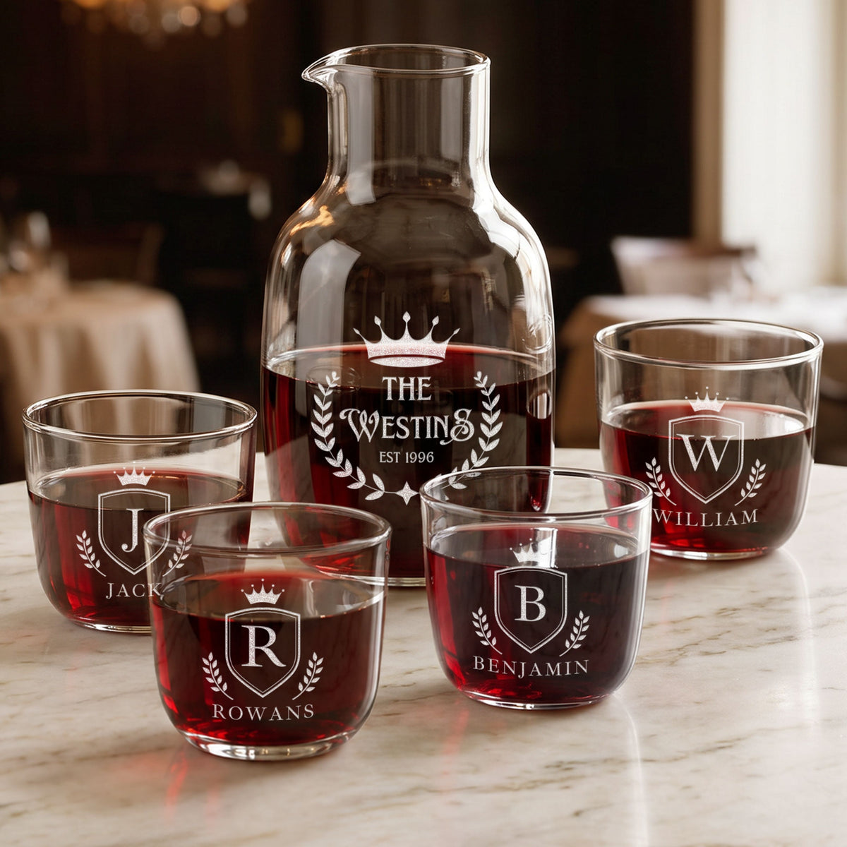 Personalised engraved glass carafe with four glasses and red wine, family monograms