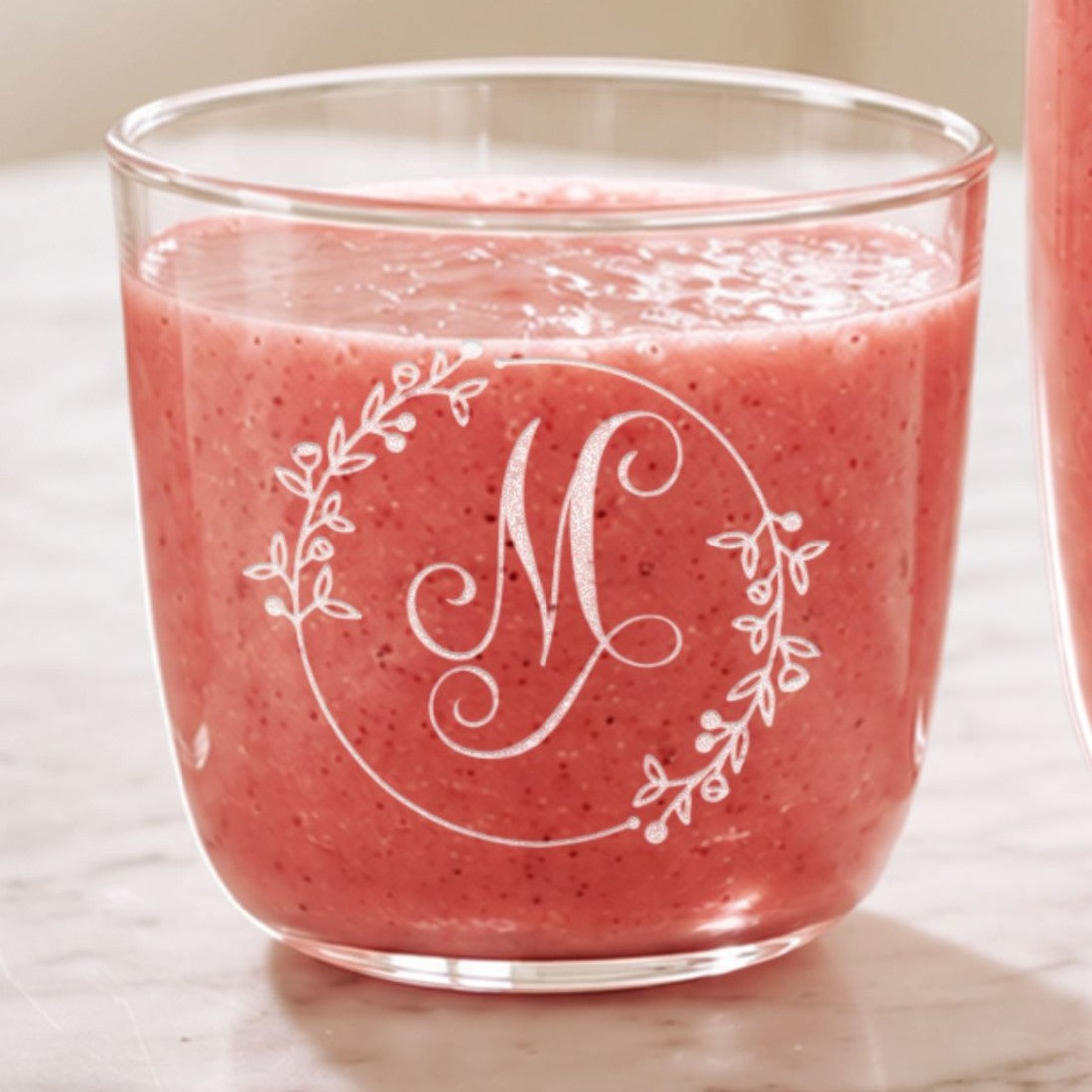 Personalised engraved glass tumbler with a smoothie and a monogram design