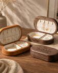 Personalised engraved oval wooden jewellery boxes in walnut and cherry