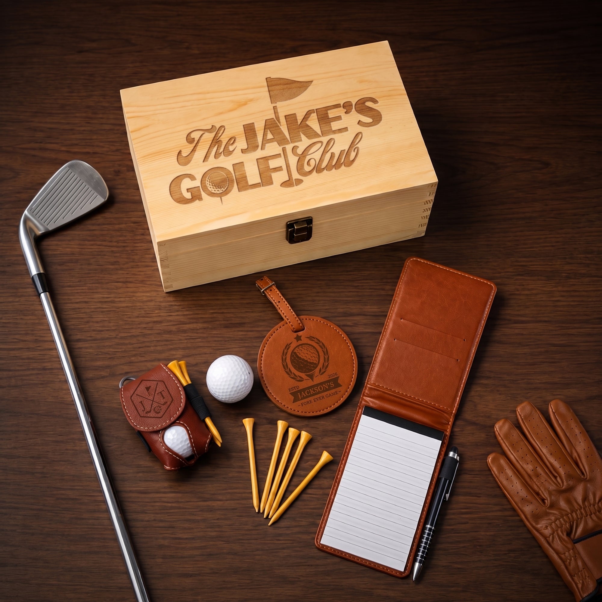Personalised golf gift set with engraved leather items in a wooden keepsake box