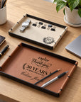 Personalised leatherette serving trays in brown and beige, engraved on a desk