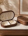 Personalised engraved oval wooden jewellery box open showing velvet ring and necklace sections