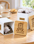Personalised white steel tea canisters with monogram designs engraved on the bamboo lids