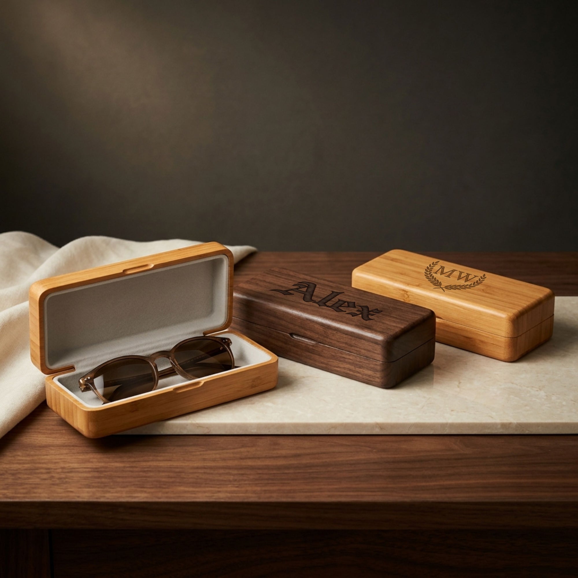Personalised engraved walnut glasses case open showing soft grey felt lining