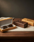 Personalised engraved walnut glasses case open showing soft grey felt lining