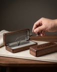 Personalised engraved walnut wood glasses case being opened – custom eyewear gift