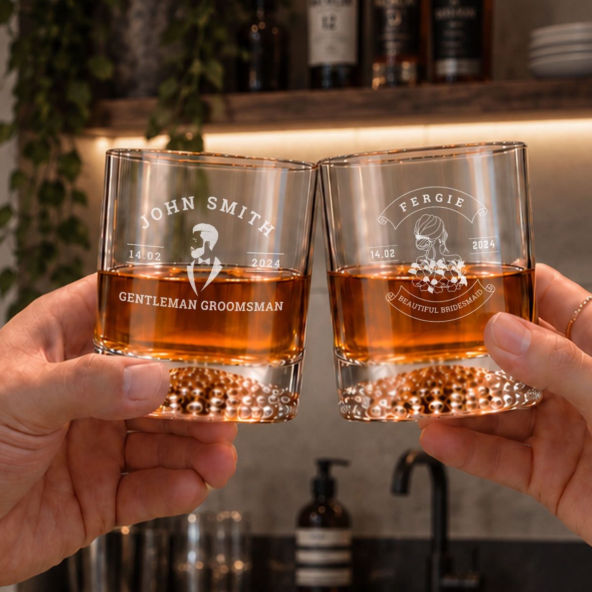 Two personalised engraved whisky glasses for a groomsman and bridesmaid, cheers