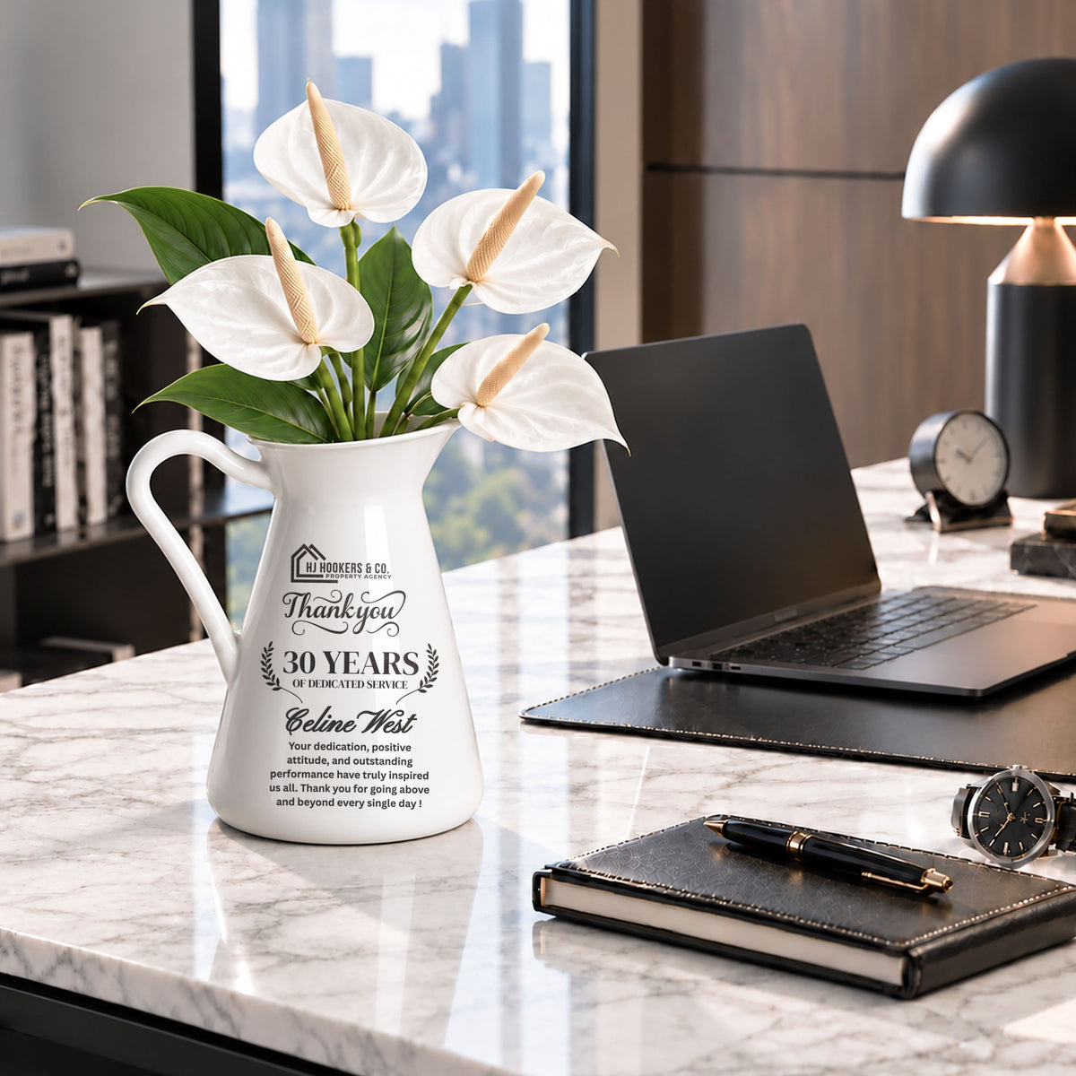 Personalised white enamel vase on a desk as a corporate retirement gift