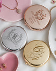 Round and square double-sided compact mirror with magnification