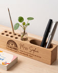Walnut and beech desk name display with business card holder and vase